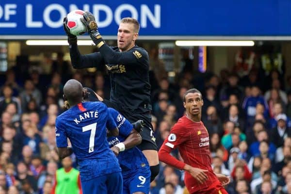 LONDON, ENGLAND - Sunday, September 22, 2019: Liverpool's goalkeeper Adrián San Miguel del Castillo catches the ball and collides with Chelsea's Tammy Abraham during the FA Premier League match between Chelsea's FC and Liverpool FC at Stamford Bridge. (Pic by David Rawcliffe/Propaganda)