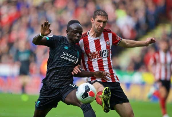 SHEFFIELD, ENGLAND - Thursday, September 26, 2019: Liverpool's Sadio Mane (L) and Sheffield United's Chris Basham during the FA Premier League match between Sheffield United FC and Liverpool FC at Bramall Lane. (Pic by David Rawcliffe/Propaganda)