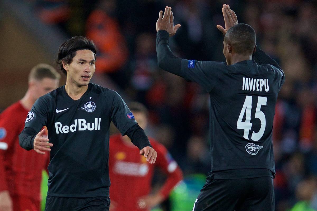 LIVERPOOL, ENGLAND - Wednesday, October 2, 2019: FC Salzburg's Takumi Minamino (L) celebrates scoring the second goal with team-mate Dal Varesanovic during the UEFA Champions League Group E match between Liverpool FC and FC Salzburg at Anfield. (Pic by David Rawcliffe/Propaganda)