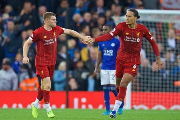 LIVERPOOL, ENGLAND - Saturday, October 5, 2019: Liverpool's James Milner (L) celebrates with team-mate Virgil van Dijk after scoring the winning second goal, an injury time penalty, during the FA Premier League match between Liverpool FC and Leicester City FC at Anfield. Liverpool won 2-1. (Pic by David Rawcliffe/Propaganda)