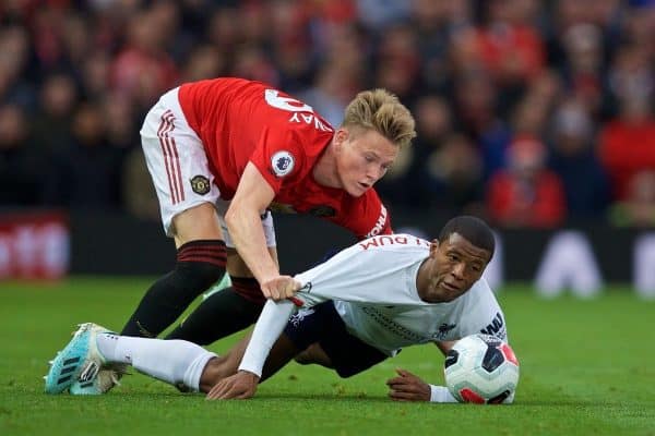 MANCHESTER, ENGLAND - Saturday, October 19, 2019: Manchester United's Scott McTominay (L) and Liverpool's Georginio Wijnaldum during the FA Premier League match between Manchester United FC and Liverpool FC at Old Trafford. (Pic by David Rawcliffe/Propaganda)