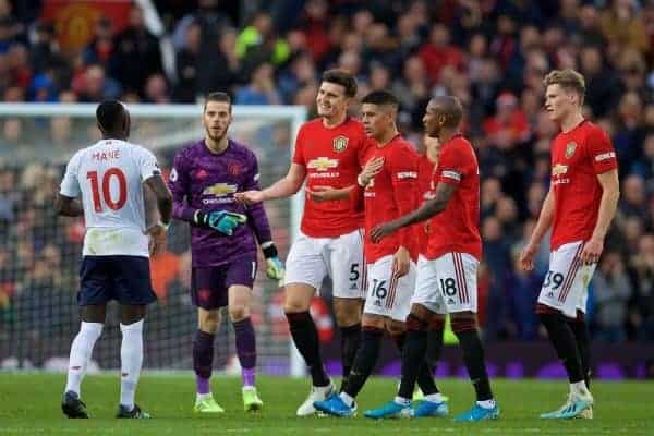 MANCHESTER, ENGLAND - Saturday, October 19, 2019: Manchester United players Harry Maguire, Marcos Rojo and Ashley Young rush to tell Liverpool's goalscorer Sadio Mane that his goal was disallowed by VAR during the FA Premier League match between Manchester United FC and Liverpool FC at Old Trafford. (Pic by David Rawcliffe/Propaganda)