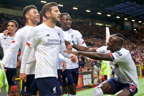 MANCHESTER, ENGLAND - Saturday, October 19, 2019: Liverpool's Adam Lallana (C) celebrates with team-mates after scoring the an equalising goal to level the score at 1-1 and help his side to continue their unbeaten start to the season during the FA Premier League match between Manchester United FC and Liverpool FC at Old Trafford. The game ended in a 1-1 draw. (Pic by David Rawcliffe/Propaganda)