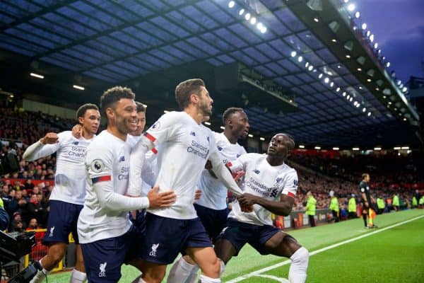 MANCHESTER, ENGLAND - Saturday, October 19, 2019: Liverpool's Adam Lallana (C) celebrates with team-mates after scoring the an equalising goal to level the score at 1-1 and help his side to continue their unbeaten start to the season during the FA Premier League match between Manchester United FC and Liverpool FC at Old Trafford. The game ended in a 1-1 draw. (Pic by David Rawcliffe/Propaganda)