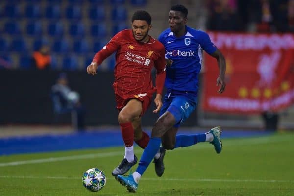 GENK, BELGIUM - Wednesday, October 23, 2019: Liverpool's Joe Gomez (L) and KRC Genk's Paul Onuachu during the UEFA Champions League Group E match between KRC Genk and Liverpool FC at the KRC Genk Arena. (Pic by David Rawcliffe/Propaganda)