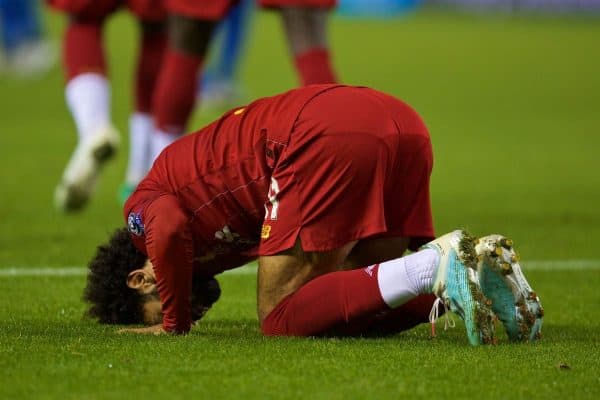 GENK, BELGIUM - Wednesday, October 23, 2019: Liverpool's Mohamed Salah kneels to pray as he celebrates scoring the fourth goal during the UEFA Champions League Group E match between KRC Genk and Liverpool FC at the KRC Genk Arena. (Pic by David Rawcliffe/Propaganda)