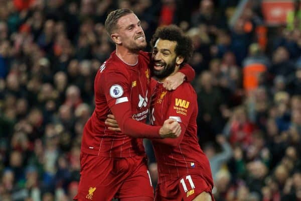 LIVERPOOL, ENGLAND - Sunday, October 27, 2019: Liverpool's Mohamed Salah (R) celebrates scoring the second goal, from a penalty kick, with team-mate captain Jordan Henderson during the FA Premier League match between Liverpool FC and Tottenham Hotspur FC at Anfield. (Pic by David Rawcliffe/Propaganda)