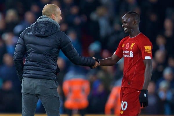 LIVERPOOL, ENGLAND - Sunday, November 10, 2019: Liverpool's Sadio Mané is all smiles as he shakes hands with Manchester City's head coach Pep Guardiola, who had accused him of being a diver, after the FA Premier League match between Liverpool FC and Manchester City FC at Anfield. Liverpool won 3-1. (Pic by David Rawcliffe/Propaganda)