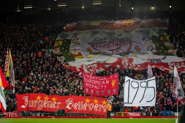 LIVERPOOL, ENGLAND - Wednesday, December 4, 2019: Liverpool supporters on the Spion Kop with a banner "1995", the year Everton last won a trophy, during the FA Premier League match between Liverpool FC and Everton FC, the 234th Merseyside Derby, at Anfield. (Pic by David Rawcliffe/Propaganda)