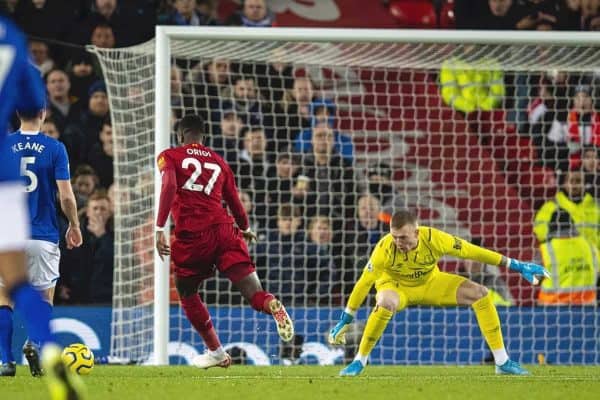 LIVERPOOL, ENGLAND - Wednesday, December 4, 2019: Liverpools Divock Origi passes Everton's goalkeeper Jordan Pickford as ge scores the first goal during the FA Premier League match between Liverpool FC and Everton FC, the 234th Merseyside Derby, at Anfield. (Pic by David Rawcliffe/Propaganda)