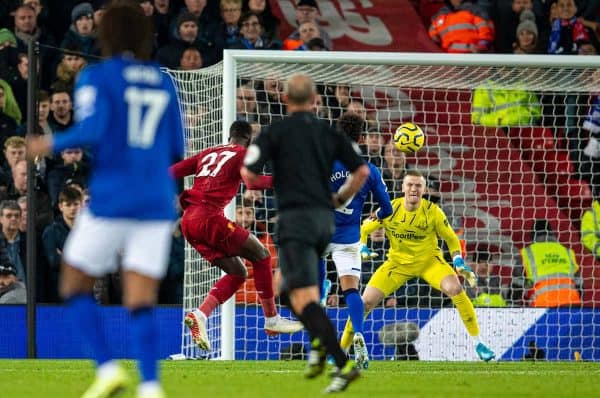 LIVERPOOL, ENGLAND - Wednesday, December 4, 2019: Liverpools Divock Origi scores the third goal past Everton's goalkeeper Jordan Pickford during the FA Premier League match between Liverpool FC and Everton FC, the 234th Merseyside Derby, at Anfield. (Pic by David Rawcliffe/Propaganda)