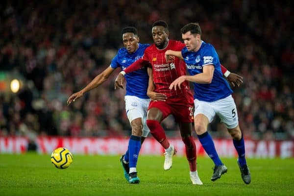 LIVERPOOL, ENGLAND - Wednesday, December 4, 2019: Liverpool's Divock Origi (C) is sandwiched between Everton's Yerry Mina (L) and Michael Keane (R) during the FA Premier League match between Liverpool FC and Everton FC, the 234th Merseyside Derby, at Anfield. (Pic by David Rawcliffe/Propaganda)