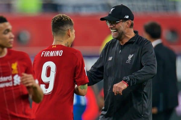 DOHA, QATAR - Wednesday, December 18, 2019: Liverpool's manager Jürgen Klopp (R) celebrates with match-winning goal-scorer Roberto Firmino after the FIFA Club World Cup Qatar 2019 Semi-Final match between CF Monterrey and Liverpool FC at the Khalifa Stadium. Liverpool won 2-1. (Pic by Peter Powell/Propaganda)