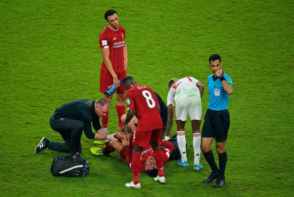 DOHA, QATAR - Saturday, December 21, 2019: Liverpool's Alex Oxlade-Chamberlain is injured during the FIFA Club World Cup Qatar 2019 Final match between CR Flamengo and Liverpool FC at the Khalifa Stadium. (Pic by Peter Powell/Propaganda)