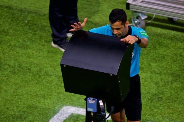 DOHA, QATAR - Saturday, December 21, 2019: Referee Abdulrahman Al Jassim reviews a penalty incidentduring the FIFA Club World Cup Qatar 2019 Final match between CR Flamengo and Liverpool FC at the Khalifa Stadium. (Pic by Peter Powell/Propaganda)