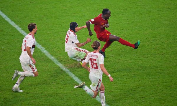 DOHA, QATAR - Saturday, December 21, 2019: Liverpool's Sadio Mané fouled by CR Flamengo's Rafael Alcântara do Nascimento 'Rafinha' but the penalty was disallowed after a VAR review during the FIFA Club World Cup Qatar 2019 Final match between CR Flamengo and Liverpool FC at the Khalifa Stadium. (Pic by Peter Powell/Propaganda)