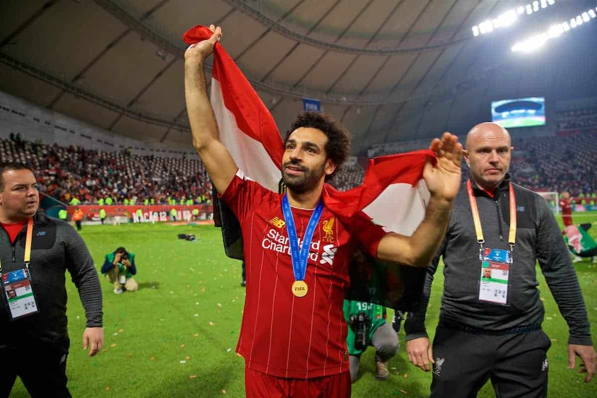 DOHA, QATAR - Saturday, December 21, 2019: Liverpool's Mohamed Salah with his winners' medal and Egypt flag after the FIFA Club World Cup Qatar 2019 Final match between CR Flamengo and Liverpool FC at the Khalifa Stadium. Liverpool won 1-0 after extra time. (Pic by David Rawcliffe/Propaganda)