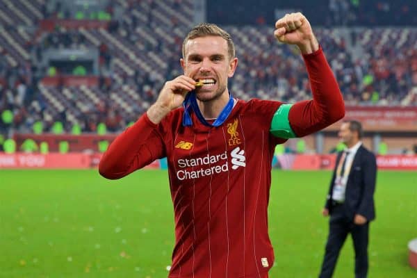 DOHA, QATAR - Saturday, December 21, 2019: Liverpool's captain Jordan Henderson bites his winners' medal after the FIFA Club World Cup Qatar 2019 Final match between CR Flamengo and Liverpool FC at the Khalifa Stadium. Liverpool won 1-0 after extra time. (Pic by David Rawcliffe/Propaganda)