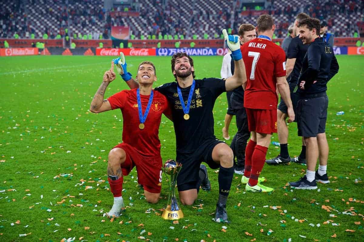 DOHA, QATAR - Saturday, December 21, 2019: Liverpool's Roberto Firmino (L) and goalkeeper Alisson Becker after the FIFA Club World Cup Qatar 2019 Final match between CR Flamengo and Liverpool FC at the Khalifa Stadium. Liverpool won 1-0 after extra time. (Pic by David Rawcliffe/Propaganda)