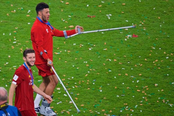 DOHA, QATAR - Saturday, December 21, 2019: Liverpool's Alex Oxlade-Chamberlain dances on crutches after the FIFA Club World Cup Qatar 2019 Final match between CR Flamengo and Liverpool FC at the Khalifa Stadium. Liverpool won 1-0 after extra-time. (Pic by Peter Powell/Propaganda)