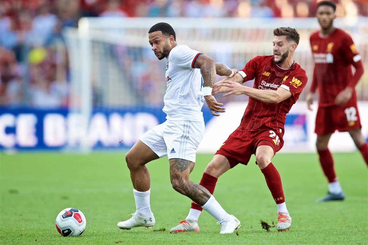 GENEVA, SWITZERLAND - Wednesday, July 31, 2019: Olympique Lyonnais' Memphis Depay (L) and Liverpool's Adam Lallana during a pre-season friendly match between Liverpool FC and Olympique Lyonnais at Stade de Genève. (Pic by David Rawcliffe/Propaganda)