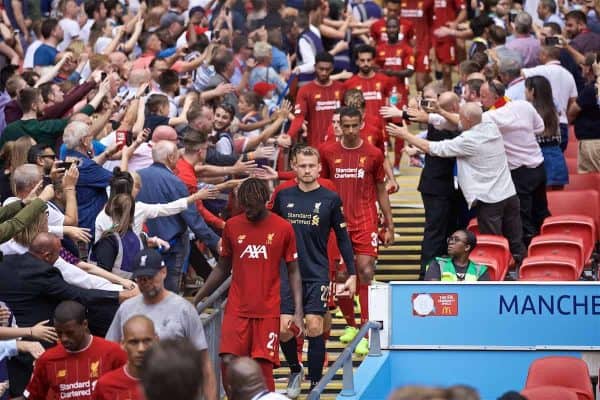 LONDON, ENGLAND - Sunday, August 4, 2019: Liverpool's Divock Origi, goalkeeper Simon Mignolet and Joel Matip walk back down the steps after picking up their runners-up medals after the penalty shoot out to decide the FA Community Shield match between Manchester City FC and Liverpool FC at Wembley Stadium. Manchester City won 5-4 on penalties after a 1-1 draw. (Pic by David Rawcliffe/Propaganda)