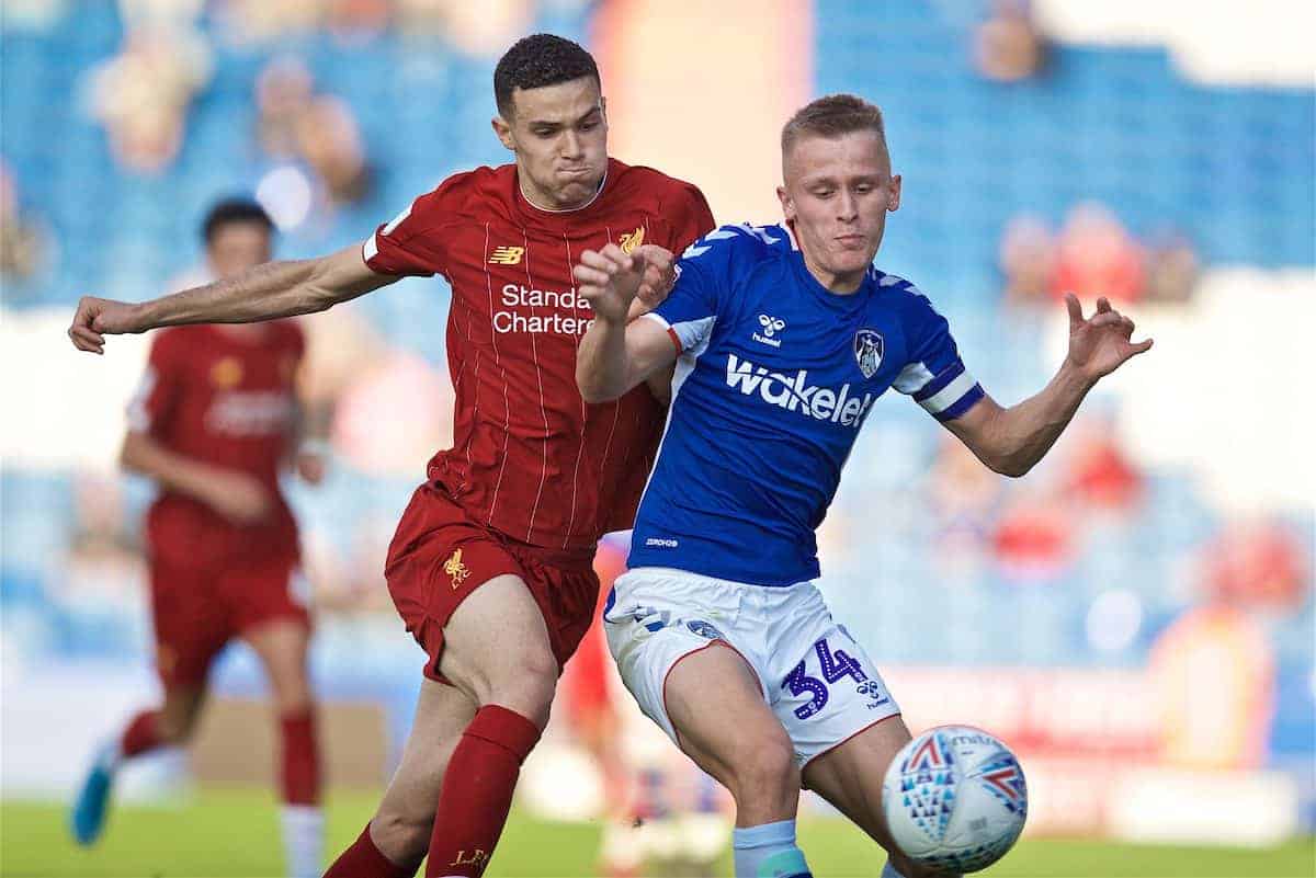 OLDHAM, ENGLAND - Wednesday, August 7, 2019: Liverpool's Issac Christie-Davies (L) challenges Oldham Athletic's Mohamad Sylla during the English Football League Trophy Northern Group B match between Oldham Athletic AFC and Liverpool FC at Boundary Park. (Pic by David Rawcliffe/Propaganda)