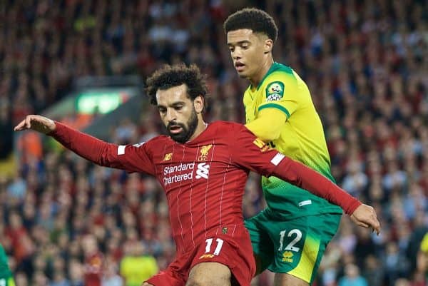 LIVERPOOL, ENGLAND - Friday, August 9, 2019: Liverpool's Mohamed Salah (L) and Norwich City's Jamal Lewis during the opening FA Premier League match of the season between Liverpool FC and Norwich City FC at Anfield. (Pic by David Rawcliffe/Propaganda)