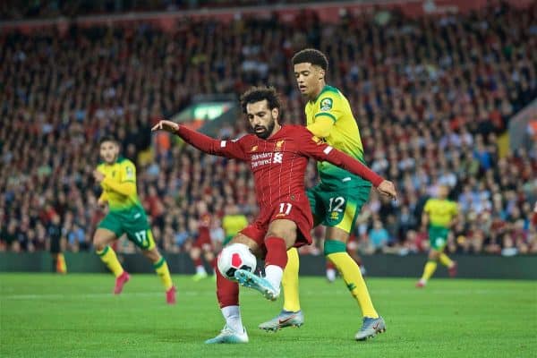 LIVERPOOL, ENGLAND - Friday, August 9, 2019: Liverpool's Mohamed Salah (L) and Norwich City's Jamal Lewis during the opening FA Premier League match of the season between Liverpool FC and Norwich City FC at Anfield. (Pic by David Rawcliffe/Propaganda)
