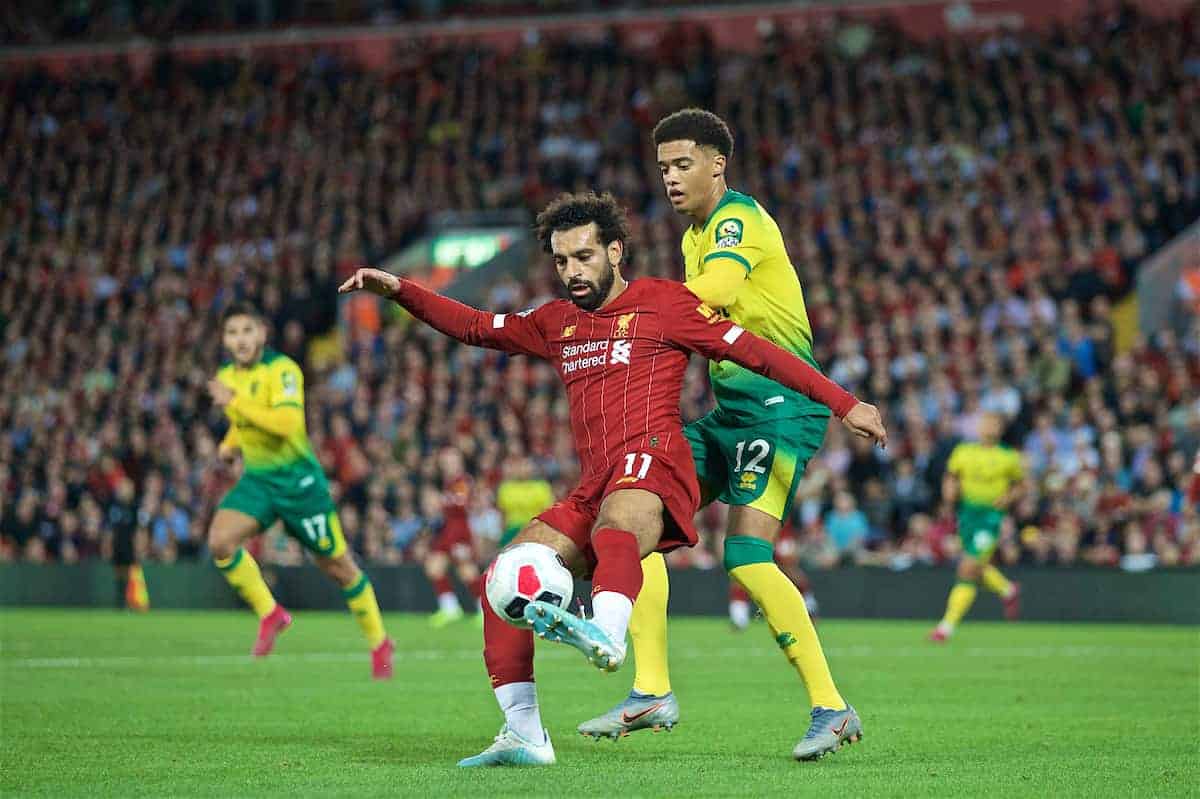 LIVERPOOL, ENGLAND - Friday, August 9, 2019: Liverpool's Mohamed Salah (L) and Norwich City's Jamal Lewis during the opening FA Premier League match of the season between Liverpool FC and Norwich City FC at Anfield. (Pic by David Rawcliffe/Propaganda)