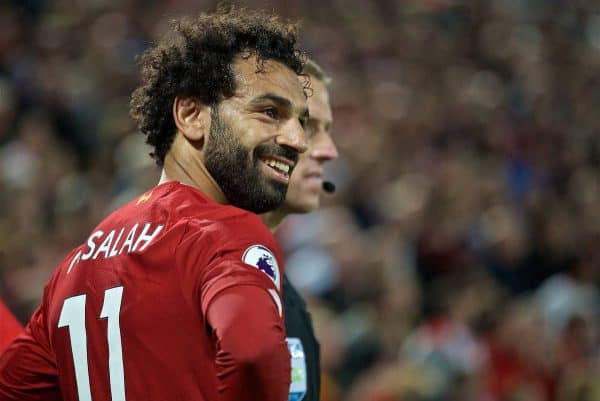 LIVERPOOL, ENGLAND - Friday, August 9, 2019: Liverpool's Mohamed Salah is all smiles as a naked streaker runs onto the pitch during the opening FA Premier League match of the season between Liverpool FC and Norwich City FC at Anfield. Liverpool won 4-1. (Pic by David Rawcliffe/Propaganda)