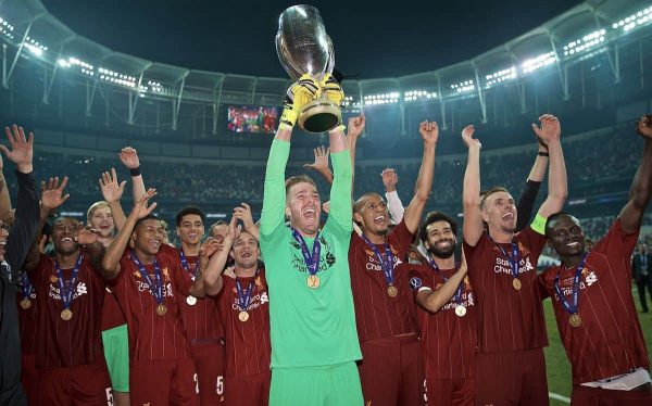 ISTANBUL, TURKEY - Wednesday, August 14, 2019: Liverpool's goalkeeper Adrián San Miguel del Castillo celebrates with the trophy after his save in the shoot-out won the Super Cup after the UEFA Super Cup match between Liverpool FC and Chelsea FC at Besiktas Park. Liverpool won 5-4 on penalties after a 1-1 draw. (Pic by David Rawcliffe/Propaganda)