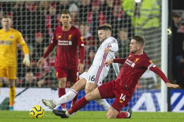 LIVERPOOL, ENGLAND - Thursday, January 2, 2020: Liverpool's captain Jordan Henderson (R) and Sheffield United's Oliver Norwood during the FA Premier League match between Liverpool FC and Sheffield United FC at Anfield. (Pic by David Rawcliffe/Propaganda)