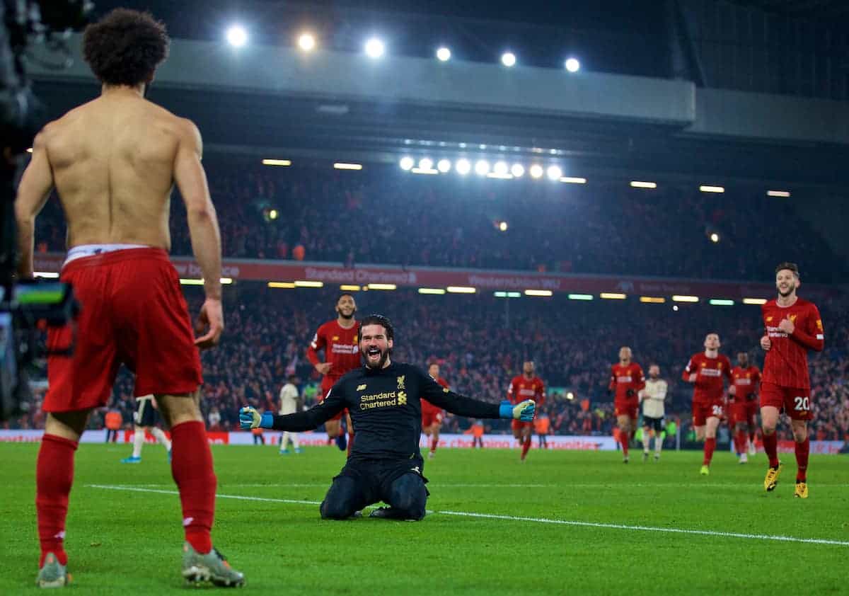 LIVERPOOL, ENGLAND - Sunday, January 19, 2020: Liverpool's Mohamed Salah celebrates scoring the second goal with team-mate goalkeeper Alisson Becker during the FA Premier League match between Liverpool FC and Manchester United FC at Anfield. (Pic by David Rawcliffe/Propaganda)