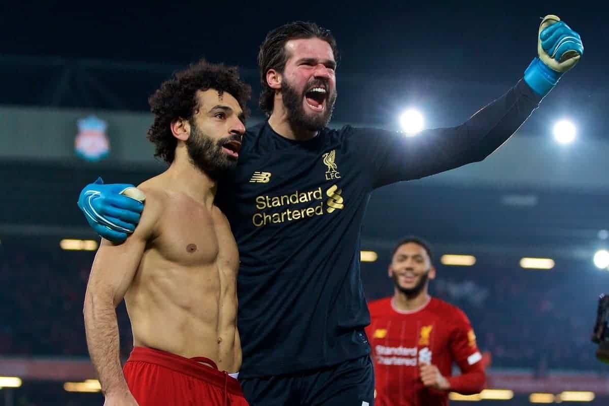 LIVERPOOL, ENGLAND - Sunday, January 19, 2020: Liverpool's Mohamed Salah celebrates scoring the second goal with team-mate goalkeeper Alisson Becker during the FA Premier League match between Liverpool FC and Manchester United FC at Anfield. (Pic by David Rawcliffe/Propaganda)