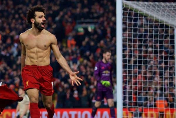 LIVERPOOL, ENGLAND - Sunday, January 19, 2020: Liverpool's Mohamed Salah takes off his shirt as he celebrate scoring the second goal during the FA Premier League match between Liverpool FC and Manchester United FC at Anfield. (Pic by David Rawcliffe/Propaganda)