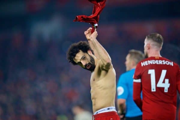 LIVERPOOL, ENGLAND - Sunday, January 19, 2020: Liverpool's Mohamed Salah takes off his shirt as he celebrates scoring the second goal during the FA Premier League match between Liverpool FC and Manchester United FC at Anfield. Liverpool won 2-0. (Pic by David Rawcliffe/Propaganda)