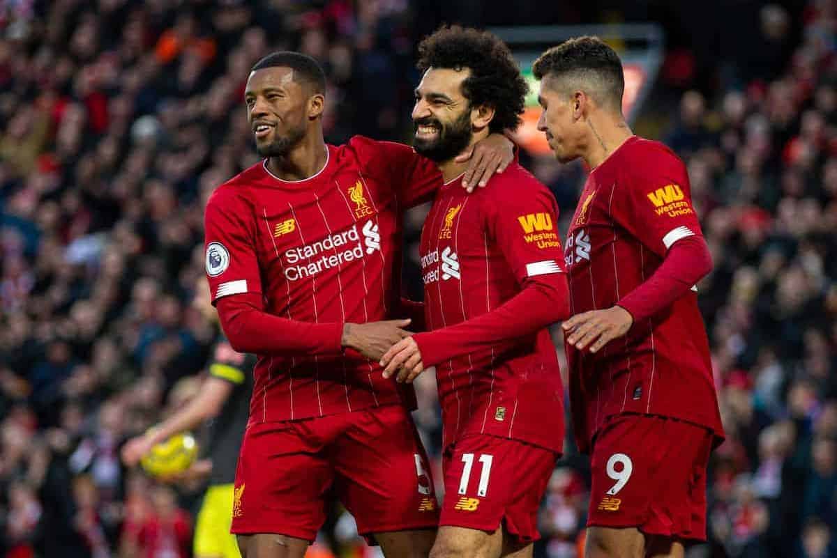 Liverpool FC players Gini Wijnaldum, Mo Salah and Roberto Firmino