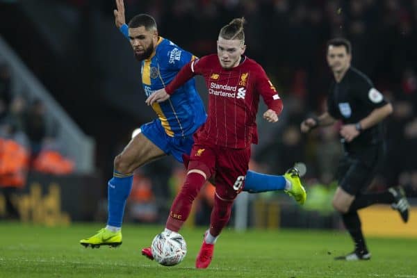 LIVERPOOL, ENGLAND - Tuesday, February 4, 2020: Liverpool's Harvey Elliott (R) gets away from Shrewsbury Town's Scott Golbourne during the FA Cup 4th Round Replay match between Liverpool FC and Shrewsbury Town at Anfield. (Pic by David Rawcliffe/Propaganda)