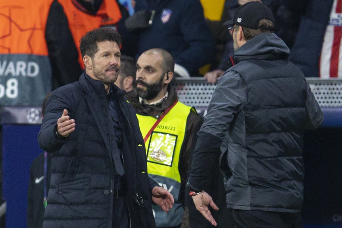 MADRID, SPAIN - Tuesday, February 18, 2020: Club Atlético de Madrid's head coach Diego Simeone (L) shakes hands with Liverpool's manager Jürgen Klopp after the UEFA Champions League Round of 16 1st Leg match between Club Atlético de Madrid and Liverpool FC at the Estadio Metropolitano. Club Atlético de Madrid won 1-0. (Pic by David Rawcliffe/Propaganda)