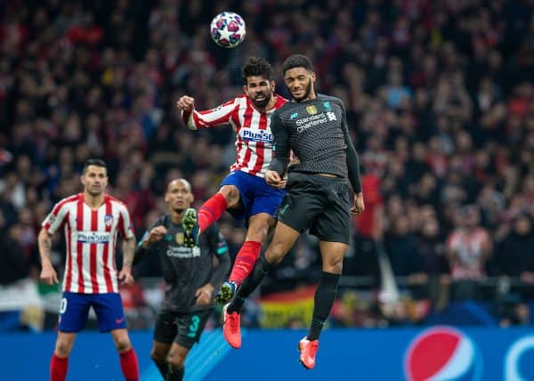 MADRID, SPAIN - Tuesday, February 18, 2020: Liverpool's Joe Gomez (R) challenges for a header with Club Atlético de Madrid's Diego Costa during the UEFA Champions League Round of 16 1st Leg match between Club Atlético de Madrid and Liverpool FC at the Estadio Metropolitano. (Pic by David Rawcliffe/Propaganda)