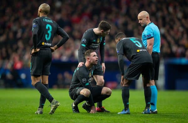 MADRID, SPAIN - Tuesday, February 18, 2020: Liverpool's captain Jordan Henderson goes down injured during the UEFA Champions League Round of 16 1st Leg match between Club Atlético de Madrid and Liverpool FC at the Estadio Metropolitano. (Pic by David Rawcliffe/Propaganda)