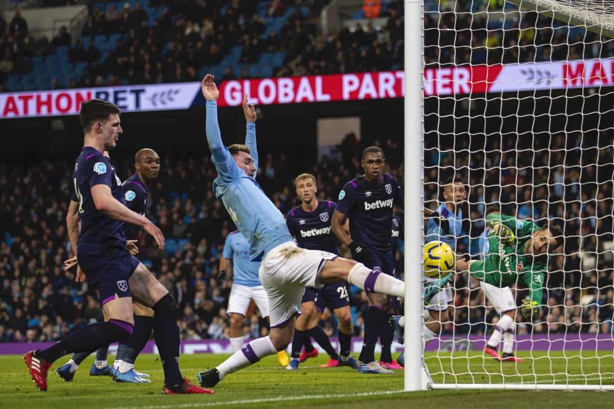 MANCHESTER, ENGLAND - Wednesday, February 19, 2020: Manchester City's Aymeric Laporte follows the ball into the net as Rodrigo Hernández Cascante 'Rodri' scores the opening goal during the FA Premier League match between Manchester City FC and West Ham United FC at the City of Manchester Stadium. (Pic by David Rawcliffe/Propaganda)