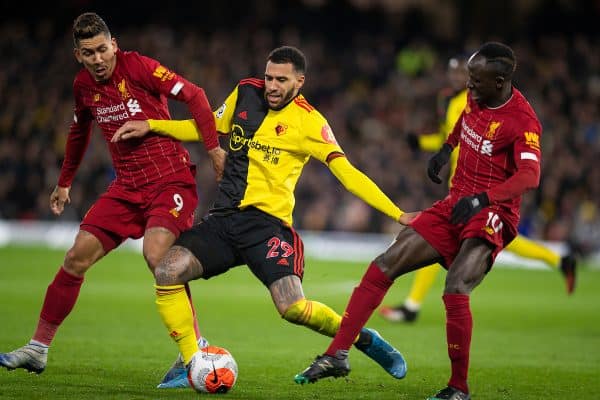 WATFORD, ENGLAND - Saturday, February 29, 2020: Liverpool's Roberto Firmino (L) and Sadio Mané challenge Watford's Étienne Capoue during the FA Premier League match between Watford FC and Liverpool FC at Vicarage Road. (Pic by David Rawcliffe/Propaganda)