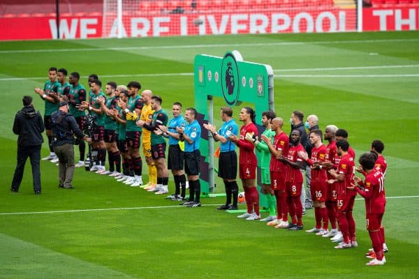 LIVERPOOL, ENGLAND - Sunday, July 5, 2020: Liverpool and Aston Villa players applaud before the FA Premier League match between Liverpool FC and Aston Villa FC at Anfield. The game was played behind closed doors due to the UK government’s social distancing laws during the Coronavirus COVID-19 Pandemic. (Pic by David Rawcliffe/Propaganda)