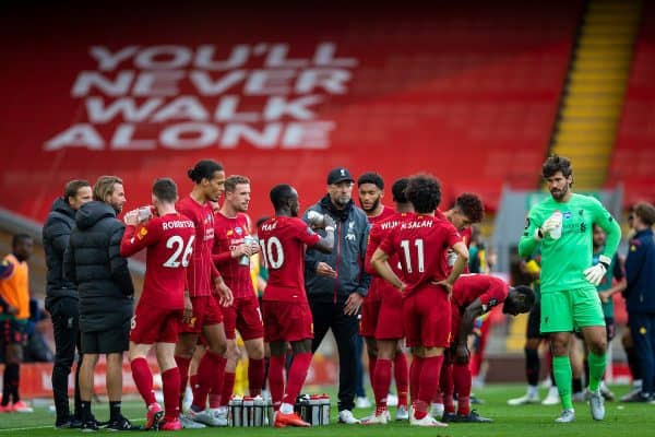 LIVERPOOL, ENGLAND - Sunday, July 5, 2020: Liverpool’s manager Jürgen Klopp speaks to his players during a water break during the FA Premier League match between Liverpool FC and Aston Villa FC at Anfield. The game was played behind closed doors due to the UK government’s social distancing laws during the Coronavirus COVID-19 Pandemic. (Pic by David Rawcliffe/Propaganda)