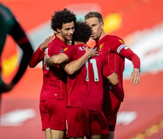 LIVERPOOL, ENGLAND - Sunday, July 5, 2020: Liverpool’s Curtis Jones (L) celebrates scoring the second goal with team-mates during the FA Premier League match between Liverpool FC and Aston Villa FC at Anfield. The game was played behind closed doors due to the UK government’s social distancing laws during the Coronavirus COVID-19 Pandemic. (Pic by David Rawcliffe/Propaganda)