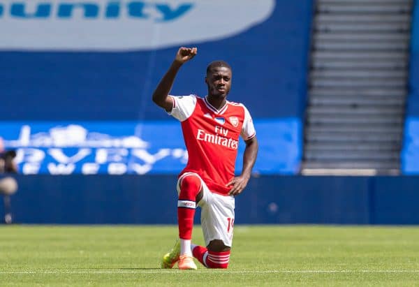 BRIGHTON & HOVE, ENGLAND - Saturday, June 20, 2020: Arsenal's Nicolas Pépé kneels down in support of the Black Lives Matter campaign during the FA Premier League match between Brighton & Hove Albion FC and Arsenal FC at the AMEX Stadium. (Pic by David Rawcliffe/Propaganda)