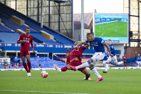 LIVERPOOL, ENGLAND - Sunday, June 21, 2019: Everton's Richarlison de Andrade shoots under pressure from Liverpool’s Fabio Henrique Tavares 'Fabinho' during the FA Premier League match between Everton FC and Liverpool FC, the 236th Merseyside Derby, at Goodison Park. The game was played behind closed doors due to the UK government’s social distancing laws during the Coronavirus COVID-19 Pandemic. (Pic by David Rawcliffe/Propaganda)