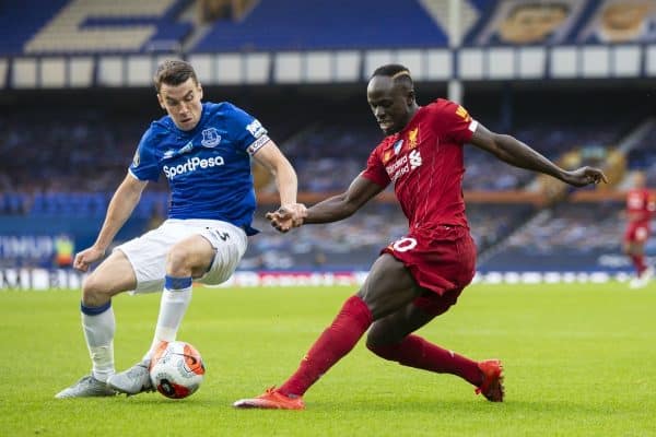 LIVERPOOL, ENGLAND - Sunday, June 21, 2019: Liverpool’s Sadio Mané (R) and Everton's captain Seamus Coleman during the FA Premier League match between Everton FC and Liverpool FC, the 236th Merseyside Derby, at Goodison Park. The game was played behind closed doors due to the UK government’s social distancing laws during the Coronavirus COVID-19 Pandemic. (Pic by David Rawcliffe/Propaganda)